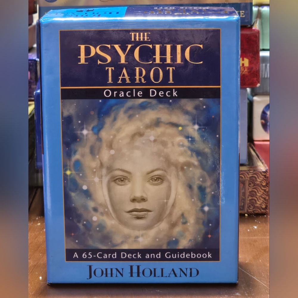 The Psychic Tarot Oracle Deck" by John Holland. It is a 65-card deck wGuide Book